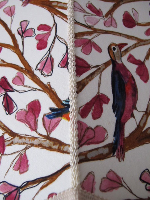 Angled view of the Birdsong in cream lampshade